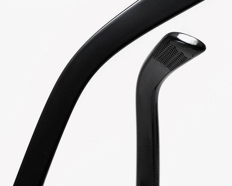 Sunglass Lover black eyeglasses temple closeup showing textured rubber tip and hinge detail blue light blocking eyeglasses for men